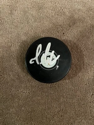 Disco autografiado por Mario Lemieux Pittsburgh Penguins Foto 1 de 2