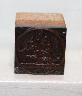 Sello de tinta vintage IRON FIREMAN con impresión de madera y cobre Foto 1 de 3