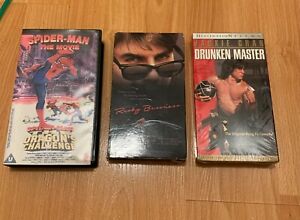 Vintage selections of  old VHS movies: Spiderman, Jackie Chan and Tom Cruz NICE
