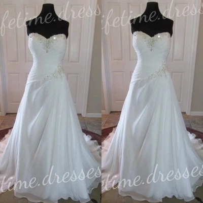 Vestidos de novia transpirables de verano de gasa con hombros descubiertos con cuentas Foto 1 de 4