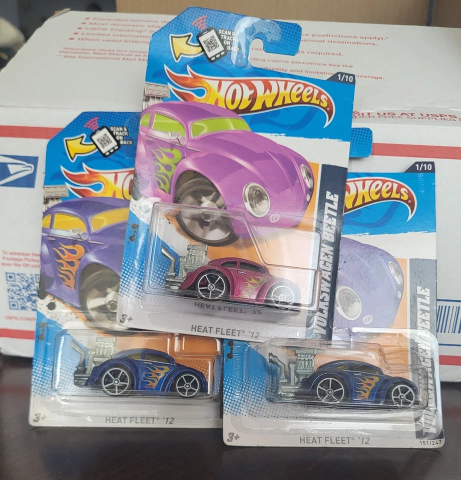 Lote de 3 autos fundidos a presión Hot Wheels Heat Fleet Volkswagen Beetles 2012 Foto 1 de 4