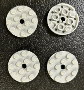 LEGO PN - Round Plate 4 x 4 w/Hole - Light Bluish Gray - 4 Pieces - New - Picture 1 of 1
