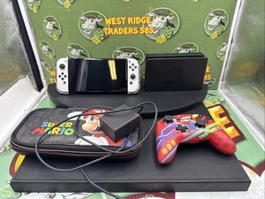 Sistema de consola portátil Nintendo Switch OLED - Blanco - Excelente como nuevo - Imagen 1 de 10