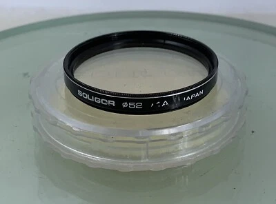 Soligor CASED LENS FILTER 52 MADE IN JAPAN BLACK CRYSTAL CLEAR CONDITION - 862 - Image 1 of 3