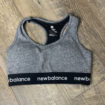 Sujetador deportivo New Balance para mujer talla pequeña gris NB ritmo espalda deportiva pulóver acolchado Foto 1 de 4