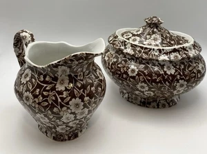 "Calico Brown 1960, Staffordshire, Inglaterra 4"" crema y azucarero ovalado con tapa usado en excelente estado" - Imagen 1 de 7