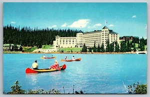 The Chateau Lake Louise canoeing AB Canada PostCard c1960s - Picture 1 of 2