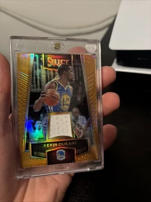 2016-17 Panini Select - Select Swatches Kevin Durant #57 Orange Prizm 14/60 - Image 1 of 2