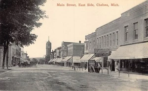 Cartolina MI: Main Street, East Side, Chelsea, Michigan, foto in bianco e nero, anni '10 - Foto 1 di 2