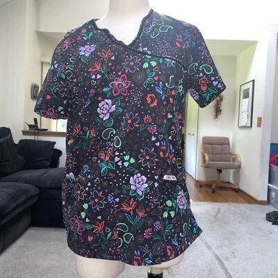 Cherokee Scrub V Neck 2 Pocket Floral Top  Cinched At Waist Size Medium  - Image 1 of 4