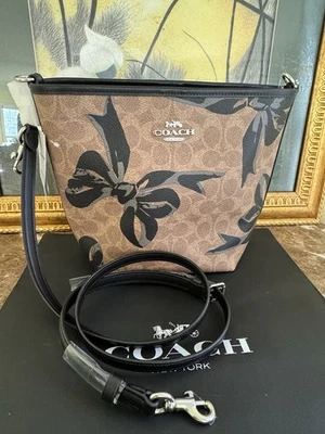 NWT Coach City Bucket Bag In Signature Canvas With Bow Print Tan Black Multi - Image 1 of 4