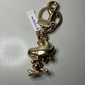 COACH X Peanuts WOODSTOCK Limited Edition Gold Metal Keychain Bag Charm NWT - Picture 1 of 9