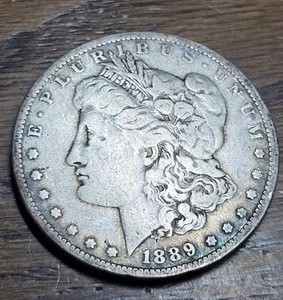1889-O Morgan Silver Dollar $1 Better Quality Coin VG Rainbow Toned - Picture 1 of 5