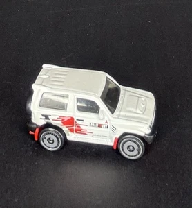 2023 hot wheels white mitsubishi pajero evolution mud studs 3/5 175/250 - Picture 1 of 5