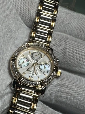 RELOJ PULSERA MUJER ANNE KLEIN CALENDARIO BISEL DIAMANTE 10/7899 6P05 DOS TONOS JAPA Foto 1 de 4