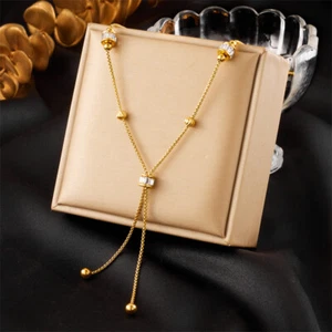 Collana donna in acciaio inox placcato oro 18 kt con zirconi tondi pendente nappa - Foto 1 di 4