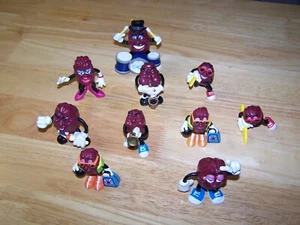 1987/8 CALIFORNIA RAISINS SCHLAGZEUGER SAX LADY BOWLER SÄNGER SURFER APPLAUS STCK 10 - Bild 1 von 9