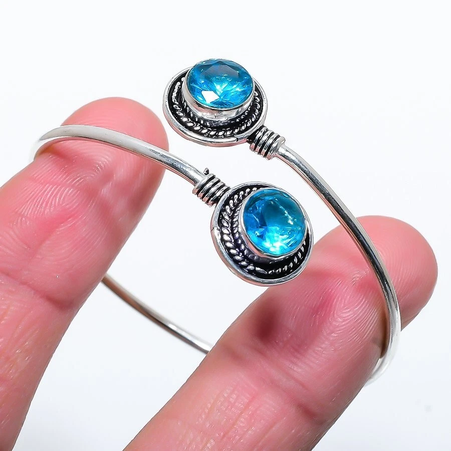 Brazalete ajustable de plata de ley 925 con piedras preciosas de topacio azul suizo Foto 1 de 1