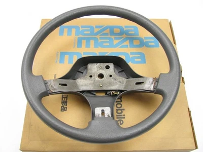 Volante nuevo genuino OEM Mazda GN52-32-980B 96 GRIS OSCURO - 1990 Mazda 626 Foto 1 de 3