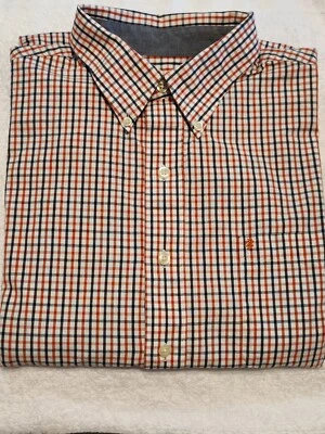 Camisa grande de manga larga con botones Izod para hombre Foto 1 de 2