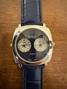 Geneva Dual Time Uhr, Edelstahlboden, Originalband, neue Batterie - Bild 1 von 7