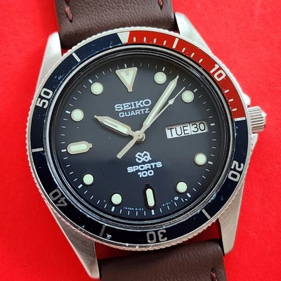 Reloj Seiko Sports 100 Buzos Bisel Pepsi Giratorio Cuero Marrón 8123-6109 Para Hombre Foto 1 de 4