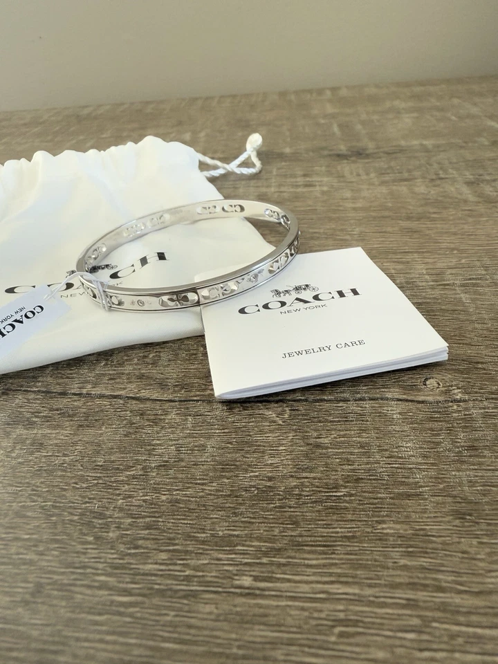 Brazalete Coach 1707 Signature cristal tono plata nuevo con etiquetas Foto 1 de 4
