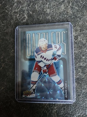 2025-26 Upper Deck Series 1 Dazzlers Blue Adam Fox Card# DZ-42 - Image 1 of 2