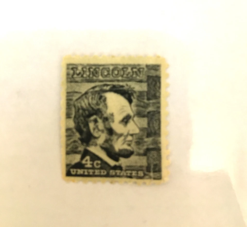 Vintage Lincoln 4 Cent Stamp Black And White not used.  - Image 1 of 1