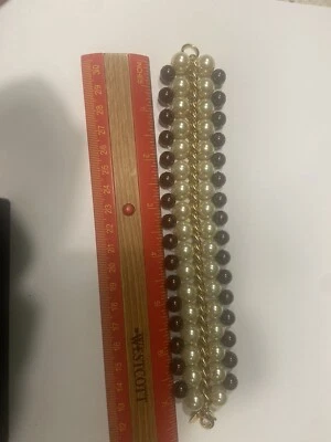 Pulsera perlas KJL $45 cada una Foto 1 de 4