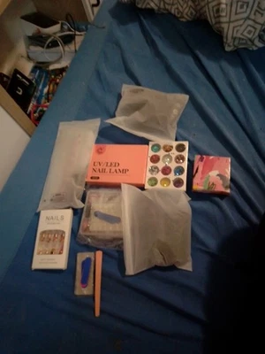 Gelnägel Starterset mit kleinen UV Lampe & Nägel zum Kleben - Bild 1 von 4