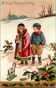 AK Freundlicher Weihnachtsgruß Kinder Zugspielzeug Puppe geprägt 1910 - Bild 1 von 3