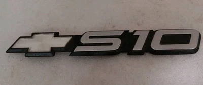 Chevrolet S10 S 10 1991-2004 puerta trasera símbolo Lodo insignia emblema OEM Foto 1 de 4