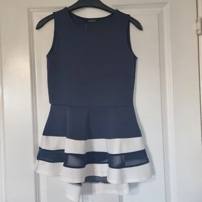 QUIZ AZUL MARINO RAYA BLANCA BORDE TRANSPARENTE FLOTANTE PEPLUM DOBLADILLO ELÁSTICO CHALECO DE TANQUE Foto 1 de 4