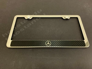1x MecedesLOGO STAINLESS STEEL LICENSE PLATE FRAME w/Carbon Fiber Style - Picture 1 of 3