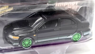 Johnny Lightning 1/64 - Mitsubishi Lancer Evo 2004 Import Heat Chase Car - Image 1 of 4