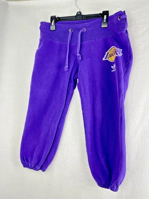 Pantalones deportivos para mujer pequeños morados de baloncesto de la NBA Adidas de Los Angeles Lakers Foto 1 de 4