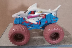 MONSTER JAM. 1:64. LOOSE. MEGALODON.MYSTERY MUDDER.MG2-06. BLUE CHASSIS. - Picture 1 of 1