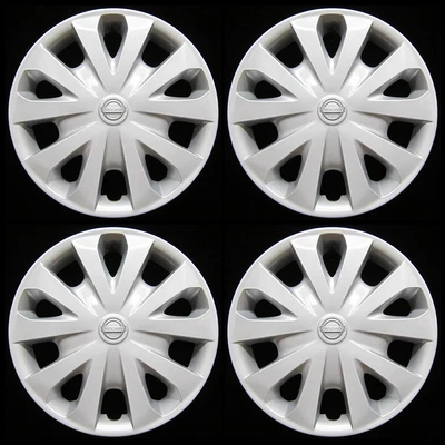 Juego de tapacubos Nissan Versa 2012-2019 genuino OEM 15 pulgadas cubierta de rueda plateada 53087 Foto 1 de 4