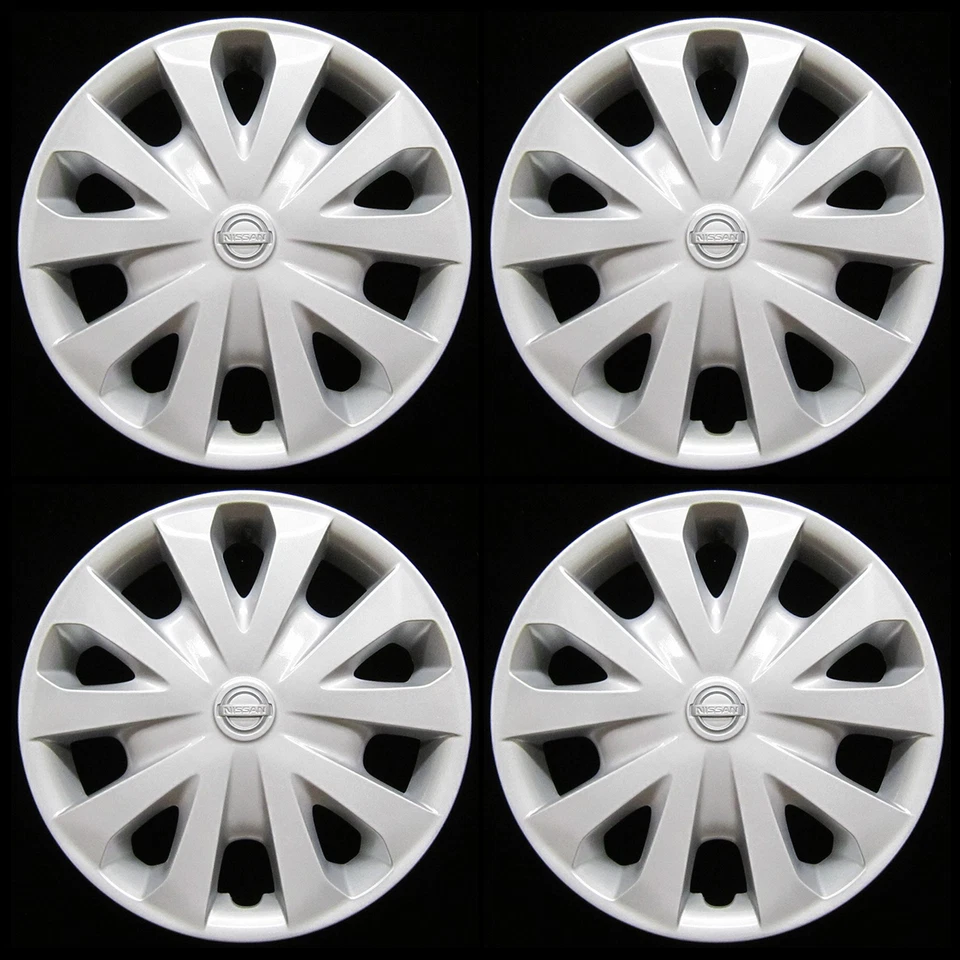 Juego de tapacubos Nissan Versa 2012-2019 genuino OEM 15 pulgadas cubierta de rueda plateada 53087 Foto 1 de 4