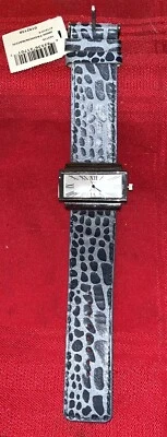 NOVO COM ETIQUETAS BUOUX TERNER RELÓGIO DE PULSO PULSEIRA AZUL ESTAMPA ANIMAL NOVA BATERIA FACE RETANGULAR - Imagem 1 de 4