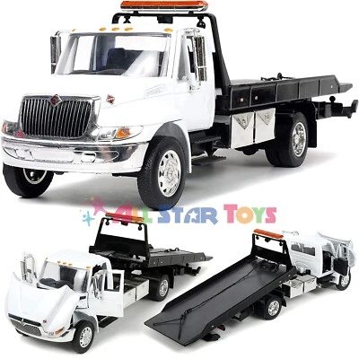 JADA 34040 INTERNATIONAL DURASTAR 4400 FLAT BED TOW TRUCK 1/24 DIECAST MODEL - Image 1 of 4