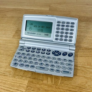 Sharp ZQ-520 Electronic Personal Organizer 1MB getestet funktioniert Retro Tech 1990’s - Bild 1 von 11