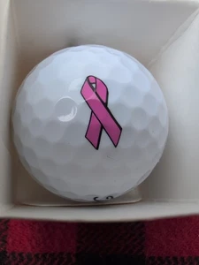Pelota de golf Titleist cinta rosa logotipo cáncer de mama / DT Carry / Susan G. Komen - Imagen 1 de 6