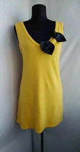 Anna Sui Tunika Größe M L ? Gelbe ärmellose Wolle? Große schwarze Schleife Top Bluse  - Bild 1 von 7