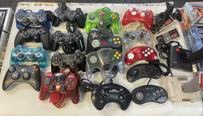 Lot of 21 Mixed Controllers ps2 360 n64 sega nes parts repair - Image 1 of 4