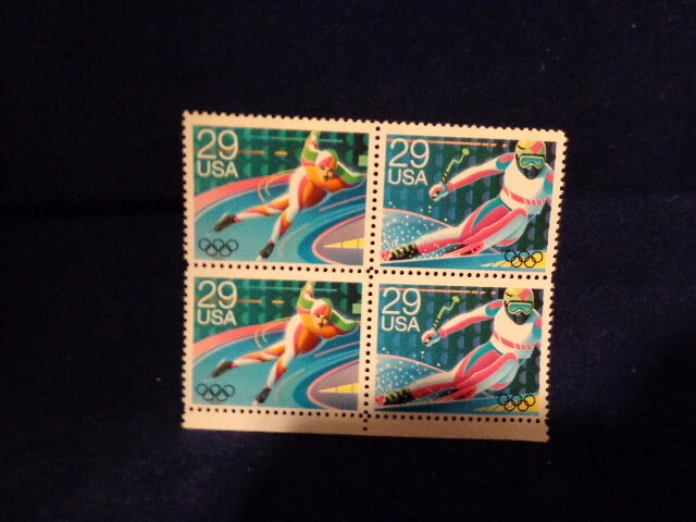4 unused 29 Cent Olympics Ice Skating Skiing Stamps - Image 1 of 1