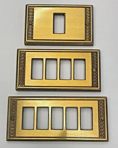 PLACCA BTICINO PIUMA AURORA OTTONE 4 O 5 POSTI PLACCHETTA OTTONATA FORI LUCI - Imagen 1 de 4