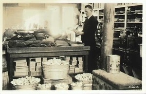 Old General Store Market Fabric Jeans Shoes Eggs And More 1940s RPPC Postcard - Picture 1 of 2