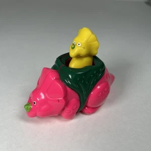 Vintage 1990s SL Toys Pink Triceratops Dino Car with Yellow Driver - Picture 1 of 4